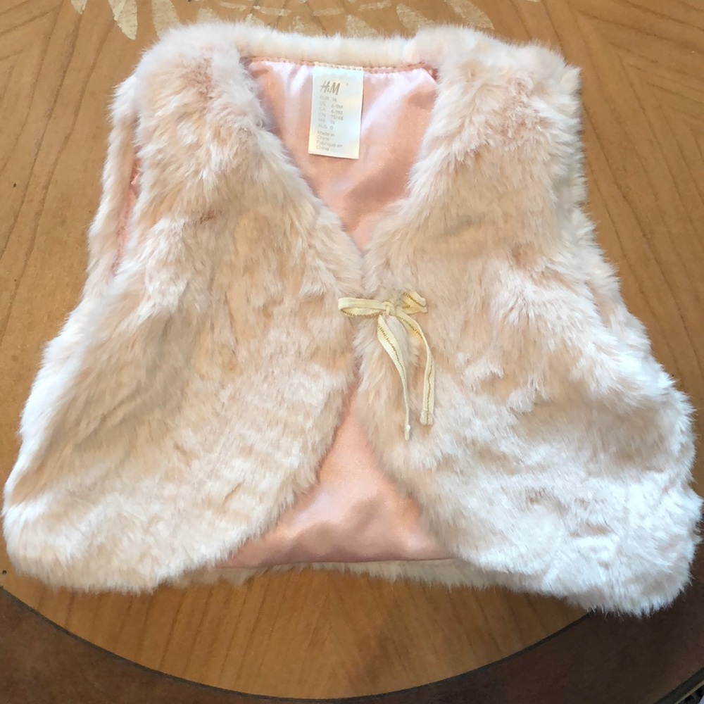 Pink fur vest